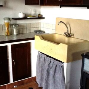 Built-in kitchen with stone sink