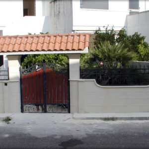 Stone cladding for the surrounding wall and entrance