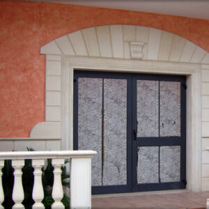 Stone frame and cladding for entrances